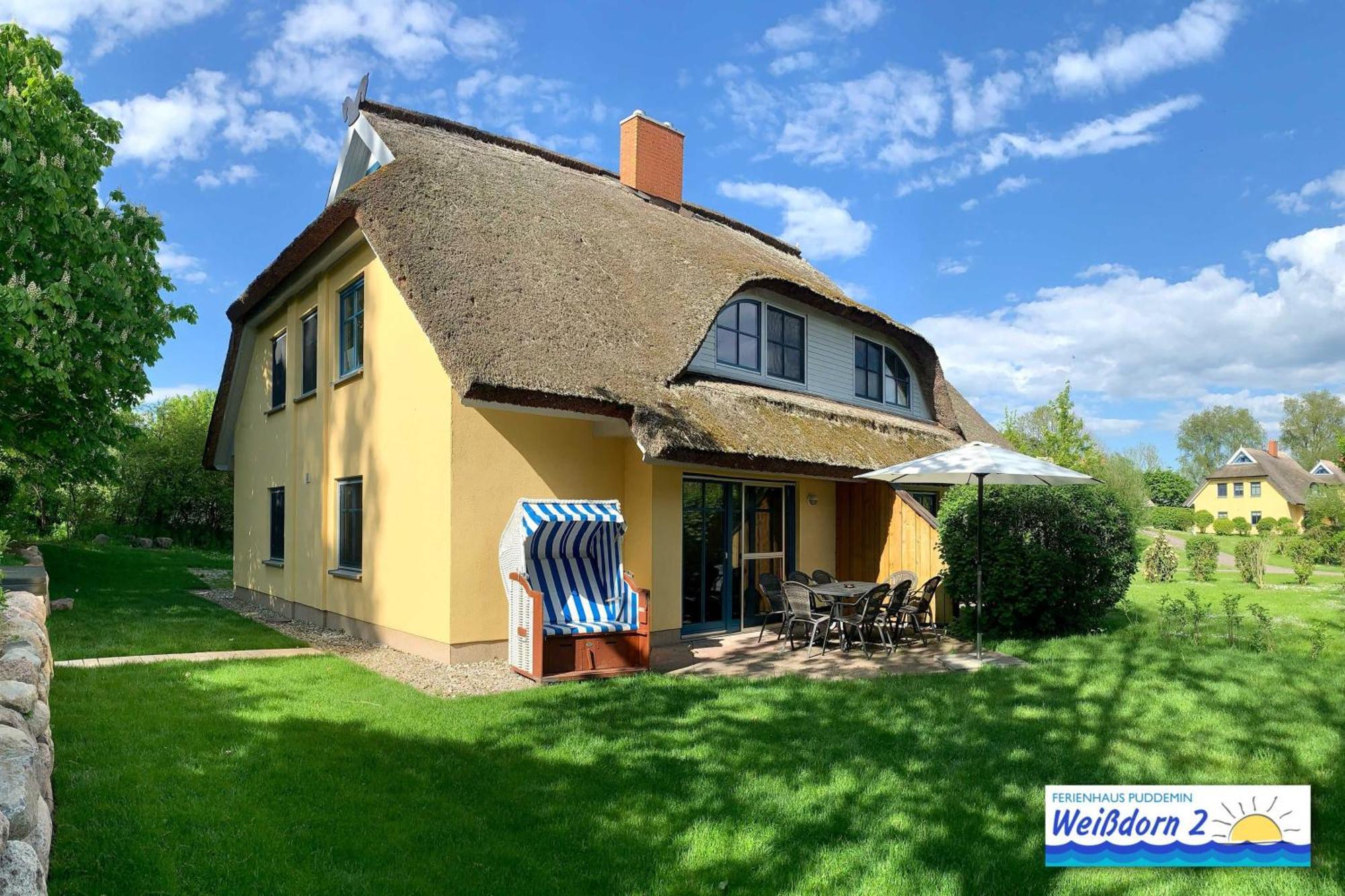 Familienfreundliches Reetdachhaus Weissdorn 2 Vila Puddemin Exterior foto